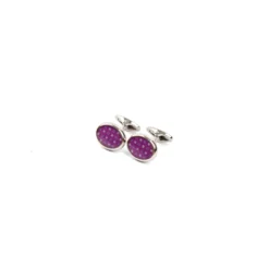 GEMELLI DA POLSO IN ARGENTO FUCSIACon microfantasia fiore
