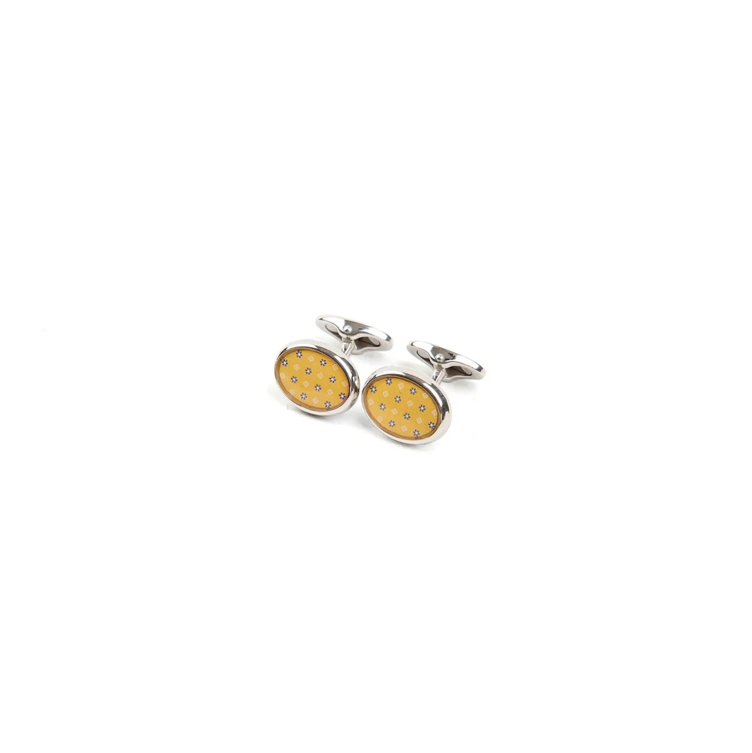 GEMELLI DA POLSO IN ARGENTO GIALLOCon microfantasia fiore