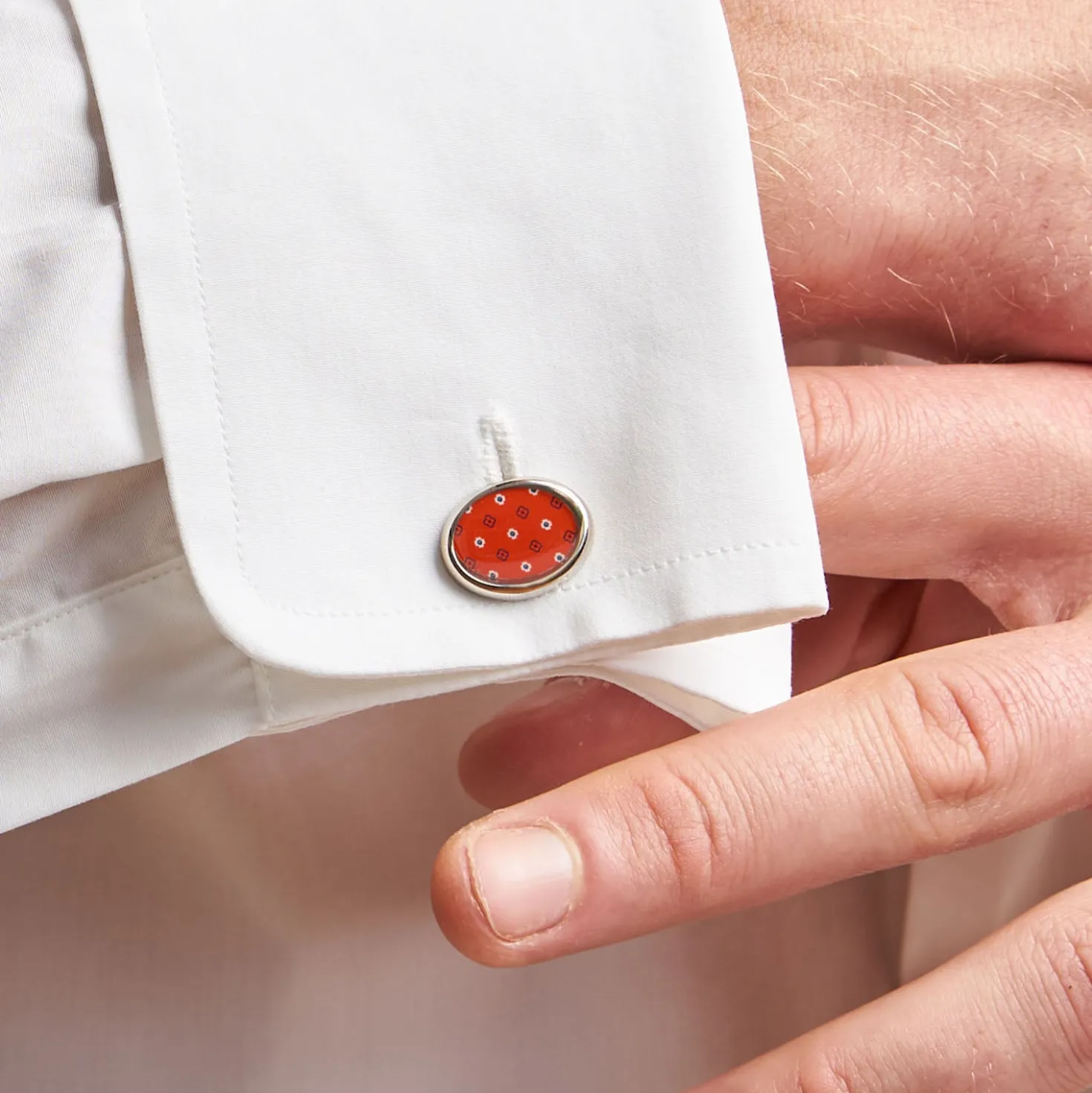 GEMELLI DA POLSO IN ARGENTO ROSSO Con microfantasia fiore