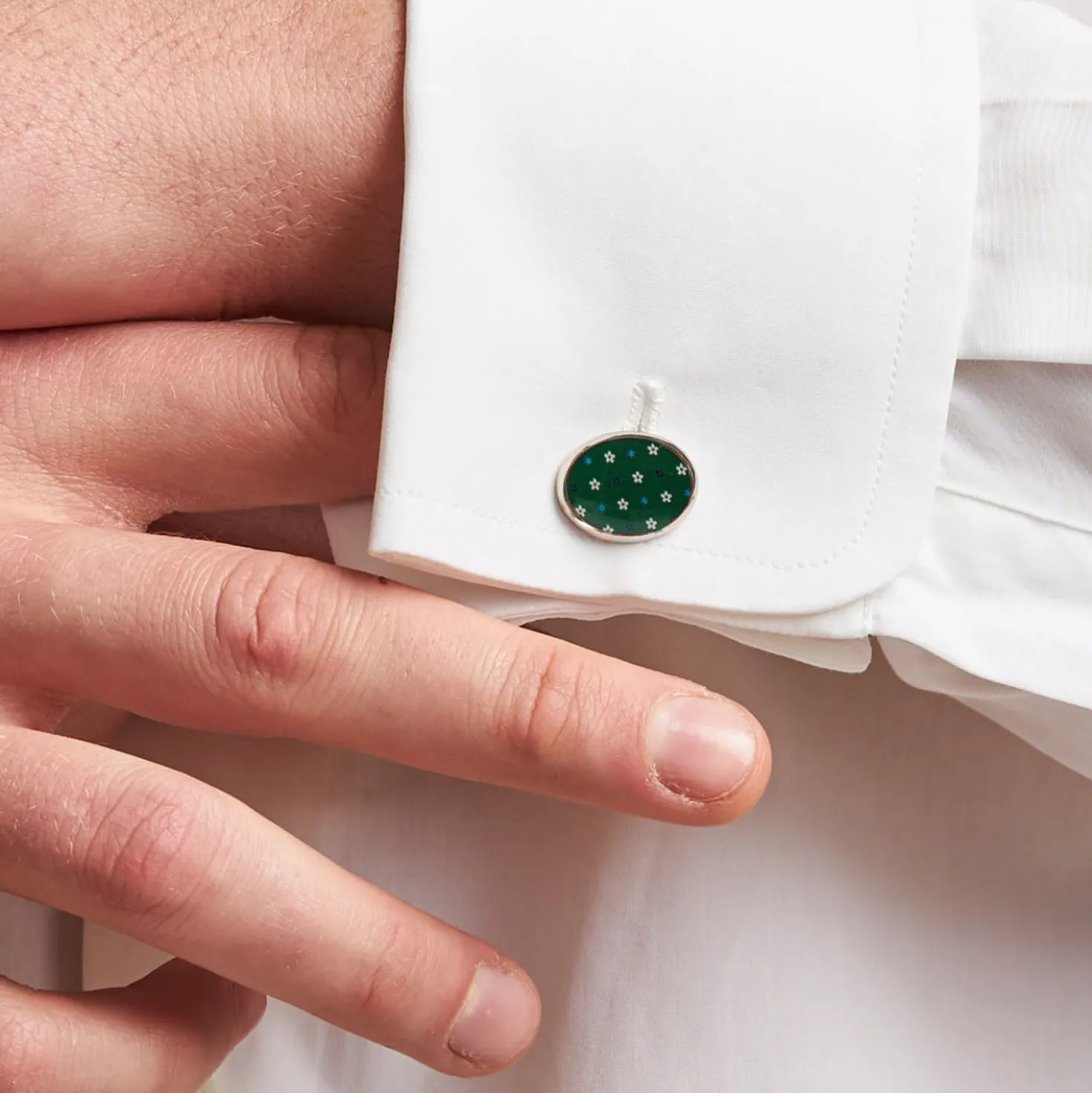 GEMELLI DA POLSO IN ARGENTO VERDE Con microfantasia fiore