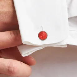 GEMELLI DA POLSO TONDO CON CORALLO In argento