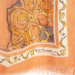 STOLA ARANCIONE IN LANA Fantasia medaglioni